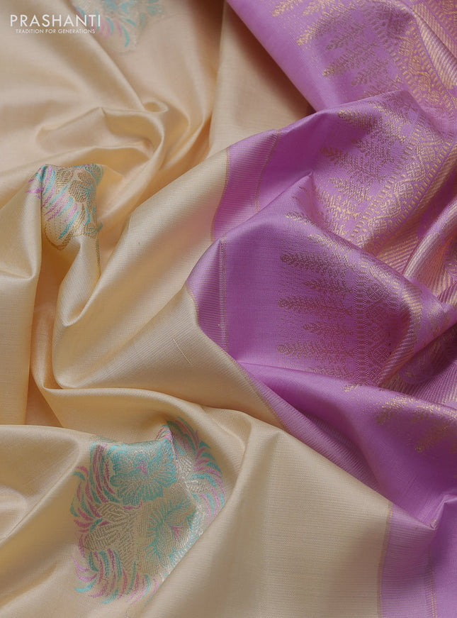 Pure kanchipuram silk saree cream and mild lavender with thread & zari woven floral buttas and rich zari woven border