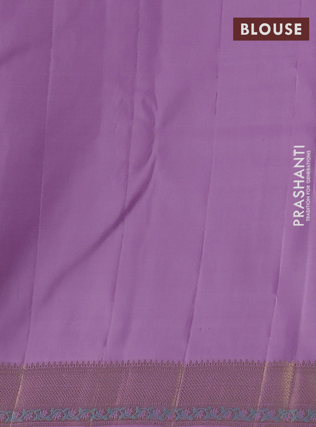 Pure kanchipuram silk saree cream and mild lavender with thread & zari woven floral buttas and rich zari woven border
