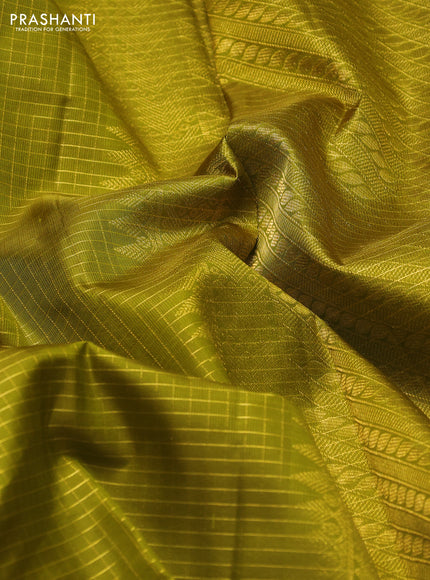 Pure kanchipuram silk saree mehendi green and green with allover zari checked pattern and zari woven border
