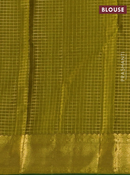 Pure kanchipuram silk saree mehendi green and green with allover zari checked pattern and zari woven border