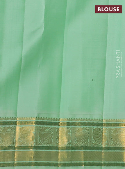 Pure kanchipuram silk saree purple and pista green with zari woven buttas and rich zari woven korvai border