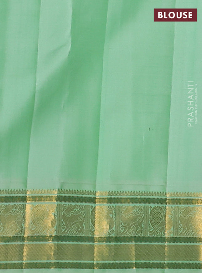 Pure kanchipuram silk saree purple and pista green with zari woven buttas and rich zari woven korvai border
