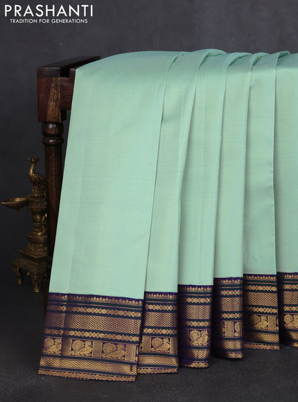 Pure kanchipuram silk saree teal blue and violet with allover vairosi pattern and rich zari woven border