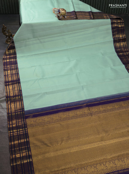 Pure kanchipuram silk saree teal blue and violet with allover vairosi pattern and rich zari woven border