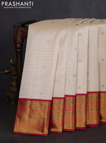 Pure kanchipuram silk saree cream and dark pink with zari woven buttas and rich zari woven korvai border