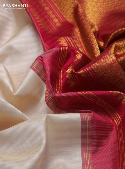 Pure kanchipuram silk saree cream and dark pink with zari woven buttas and rich zari woven korvai border