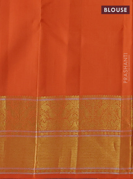 Pure kanchipuram silk saree cream and orange with zari woven buttas and rich zari woven korvai border
