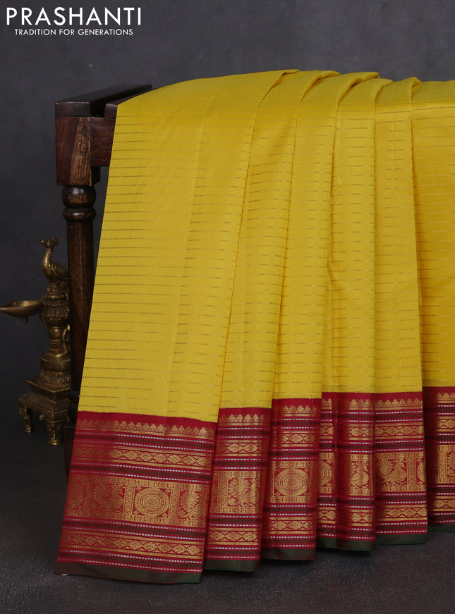 Pure kanchipuram silk saree yellow and maroon green with allover zari stripe weaves and zari woven korvai border
