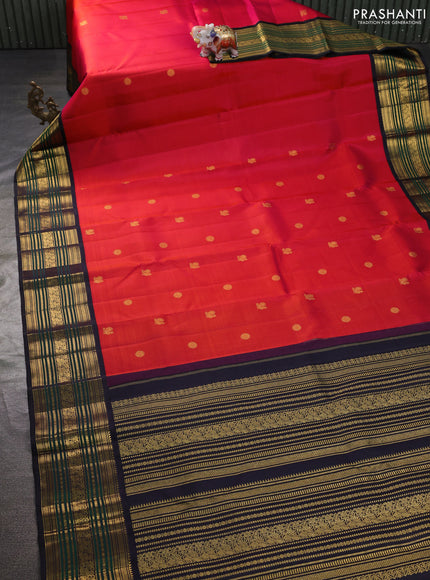 Pure kanchipuram silk saree dual shade of pinkish orange and black with annam & rudhraksha zari woven buttas and rich zari woven border