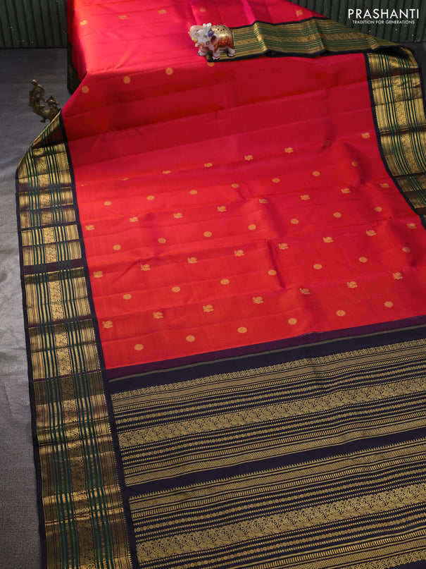 Pure kanchipuram silk saree dual shade of pinkish orange and black with annam & rudhraksha zari woven buttas and rich zari woven border