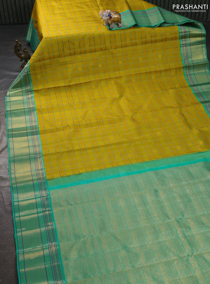 Pure kanchipuram silk saree lime yellow and teal blue with allover thread woven checked pattern and rich zari woven border