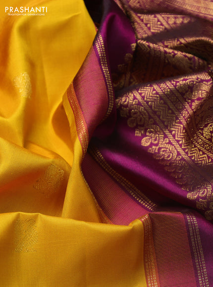 Pure kanchipuram silk saree mango yellow and dark magenta pink with zari woven buttas and rich zari woven border