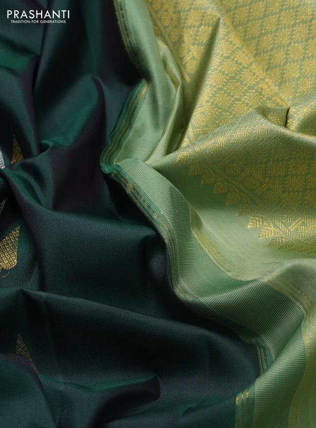 Pure kanchipuram silk saree bottle green and pastel green with silver & gold zari woven buttas and rich zari woven korvai border