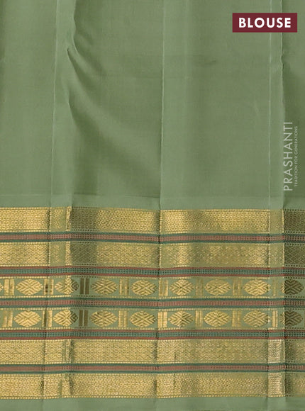 Pure kanchipuram silk saree bottle green and pastel green with silver & gold zari woven buttas and rich zari woven korvai border