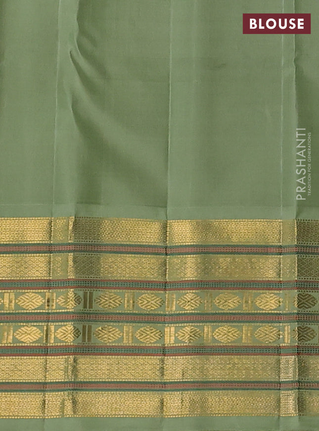 Pure kanchipuram silk saree bottle green and pastel green with silver & gold zari woven buttas and rich zari woven korvai border