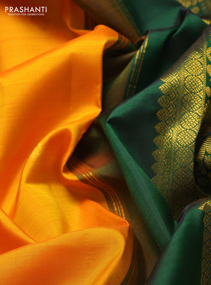 Pure kanchipuram silk saree mango yellow and bottle green with zari woven buttas and long rich zari woven korvai border
