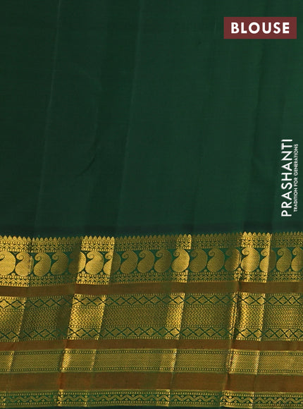 Pure kanchipuram silk saree mango yellow and bottle green with zari woven buttas and long rich zari woven korvai border