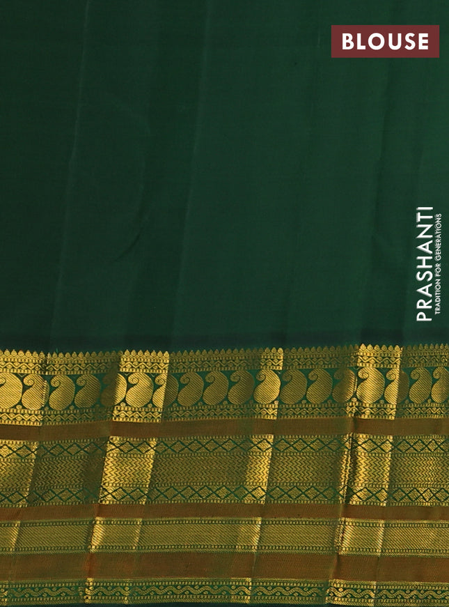 Pure kanchipuram silk saree mango yellow and bottle green with zari woven buttas and long rich zari woven korvai border