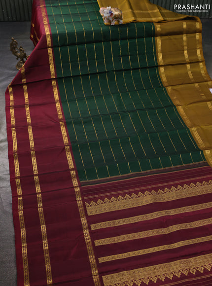 Pure kanchipuram silk saree bottle green with allover zari weaves and long zari woven border