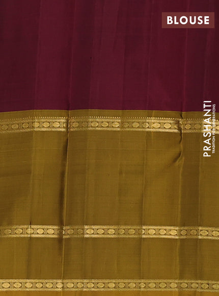 Pure kanchipuram silk saree bottle green with allover zari weaves and long zari woven border