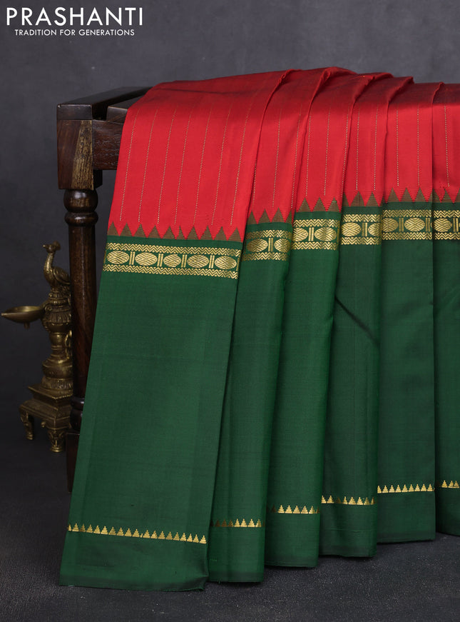Pure kanchipuram silk saree red and dark green with allover zari stripe pattern and long rettapet zari woven border
