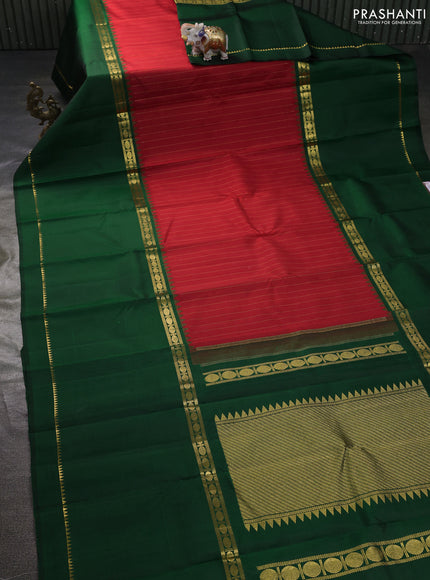 Pure kanchipuram silk saree red and dark green with allover zari stripe pattern and long rettapet zari woven border