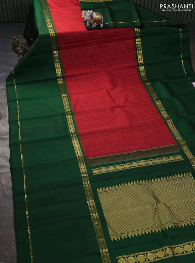 Pure kanchipuram silk saree red and dark green with allover zari stripe pattern and long rettapet zari woven border