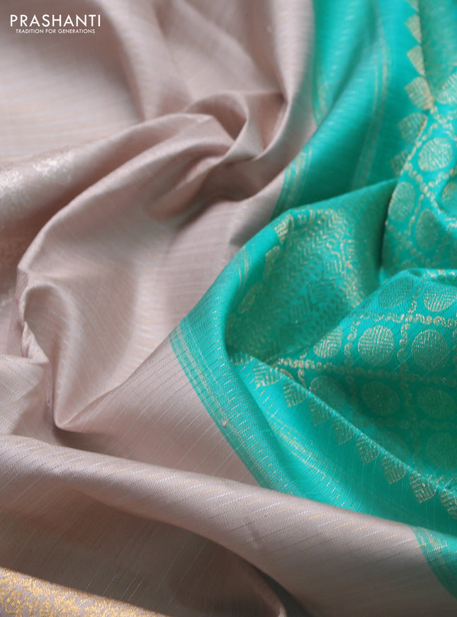 Pure kanchipuram silk saree pastel grey and teal blue with allover silver & gold zari weaves & buttas and long silver zari woven border