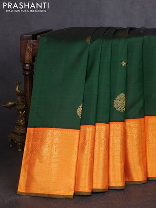 Pure kanchipuram silk saree bottle green and orange with zari woven buttas and long rich zari woven border