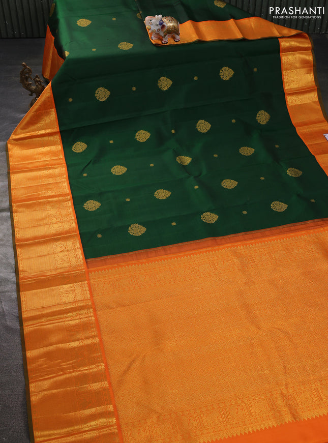 Pure kanchipuram silk saree bottle green and orange with zari woven buttas and long rich zari woven border