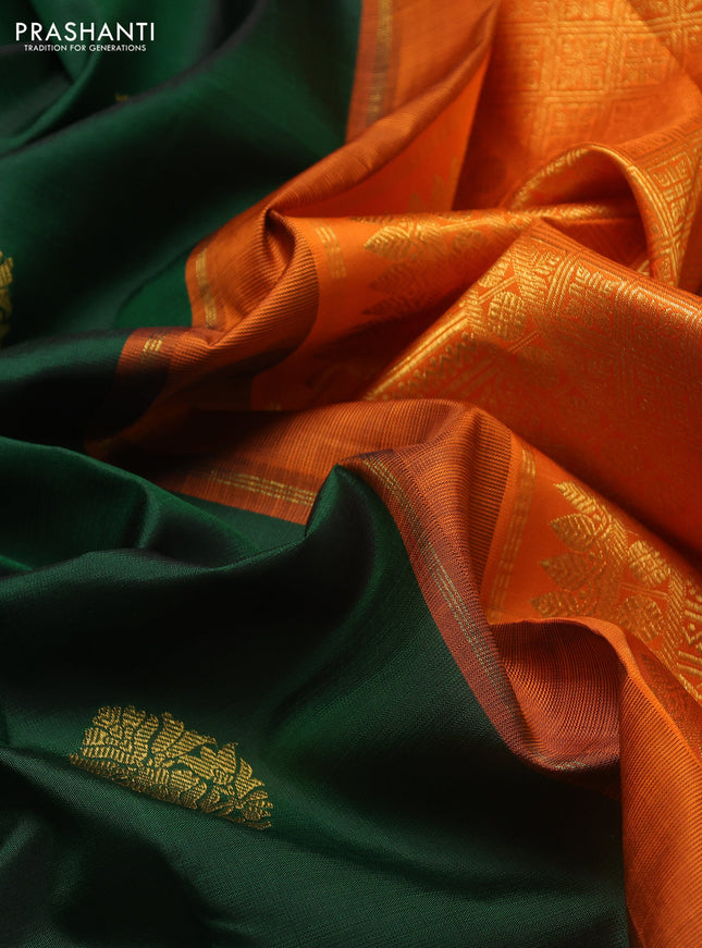 Pure kanchipuram silk saree bottle green and orange with zari woven buttas and long rich zari woven border