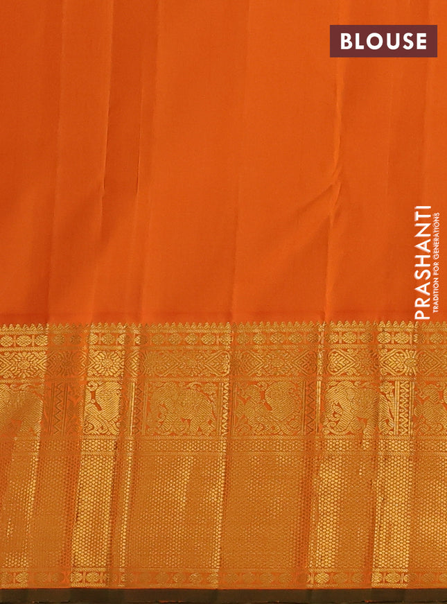 Pure kanchipuram silk saree bottle green and orange with zari woven buttas and long rich zari woven border