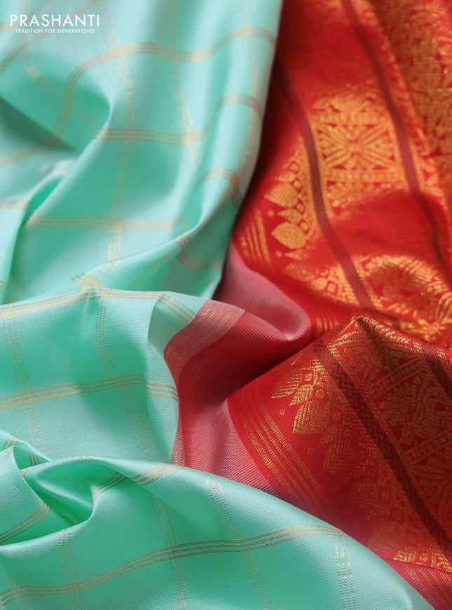 Pure kanchipuram silk saree teal blue and red with allover zari woven checked pattern and long rettapet zari woven border