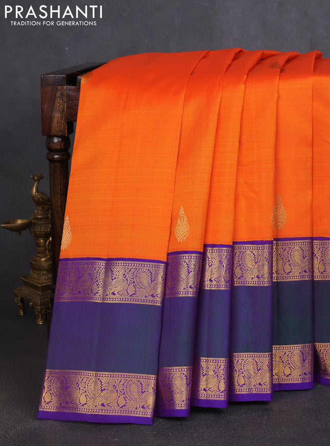 Pure kanchipuram silk saree orange and violet with zari woven buttas and long rettapet zari woven korvai border