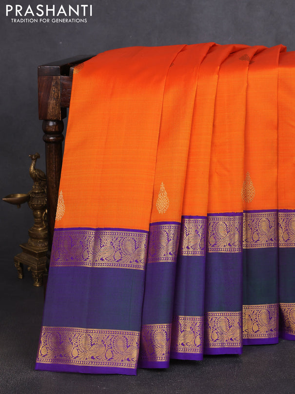 Pure kanchipuram silk saree orange and violet with zari woven buttas and long rettapet zari woven korvai border