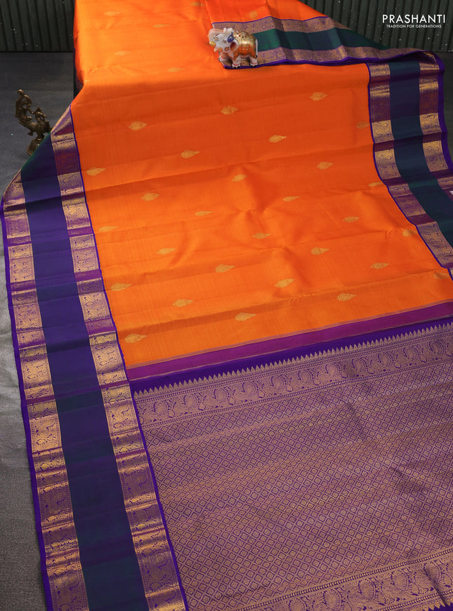 Pure kanchipuram silk saree orange and violet with zari woven buttas and long rettapet zari woven korvai border