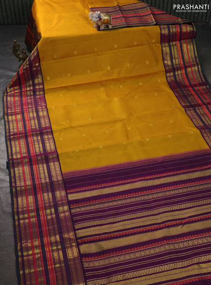 Pure kanchipuram silk saree yellow and purple with annam & rudhraksha zari woven buttas and long rich zari woven border