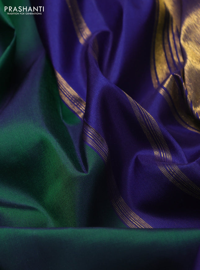Pure kanchipuram silk saree dual shade of green and blue with temple design zari weaves in borderless style