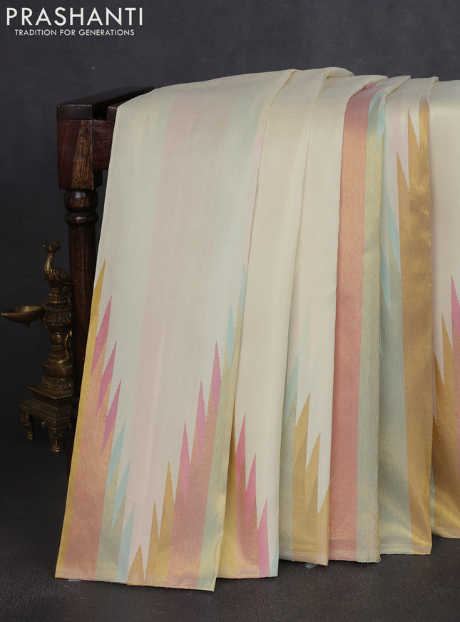 Pure kanchipuram silk saree cream and light pink with temple design zari weaves in borderless style
