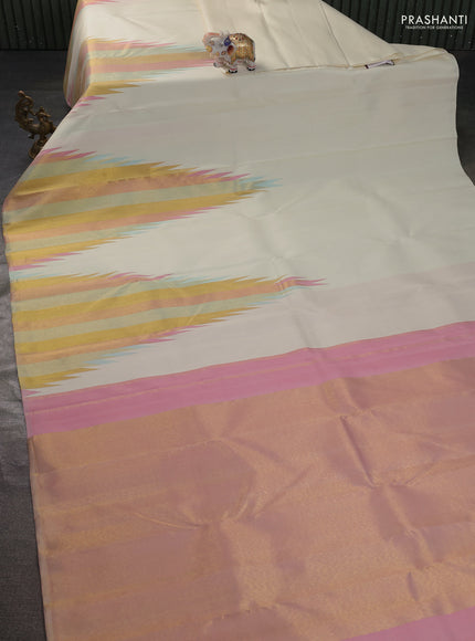 Pure kanchipuram silk saree cream and light pink with temple design zari weaves in borderless style