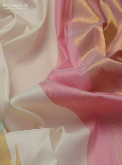 Pure kanchipuram silk saree cream and light pink with temple design zari weaves in borderless style