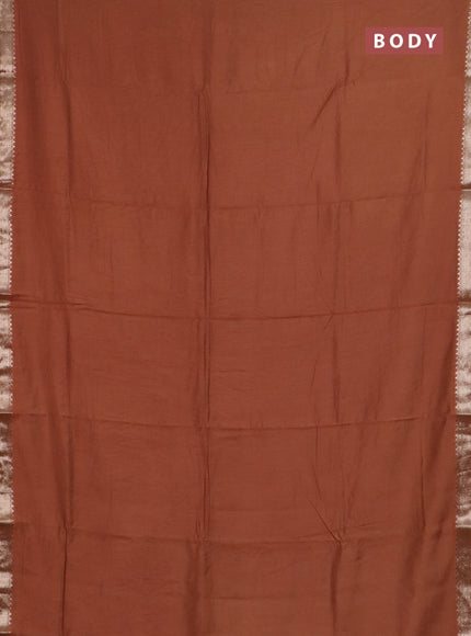 Semi chanderi saree rust shade and beige with plain body and zari woven border