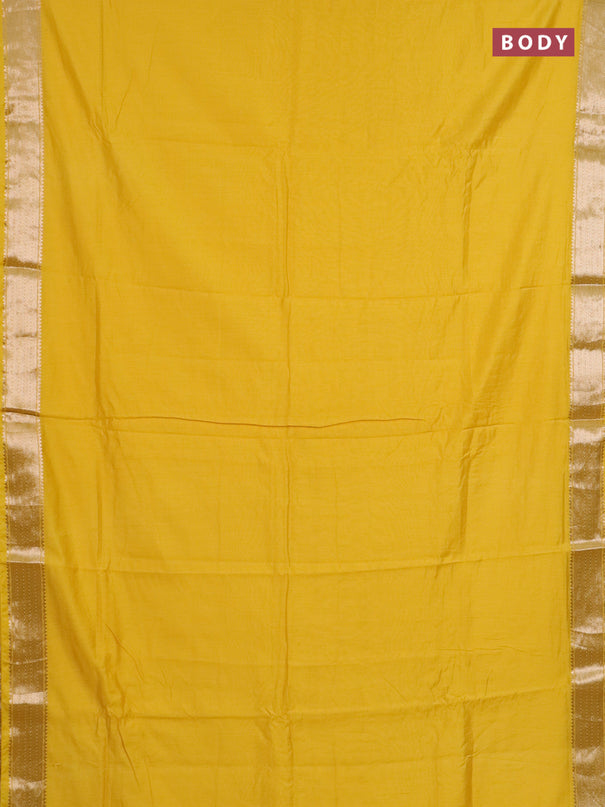 Semi chanderi saree yellow and beige with plain body and zari woven border