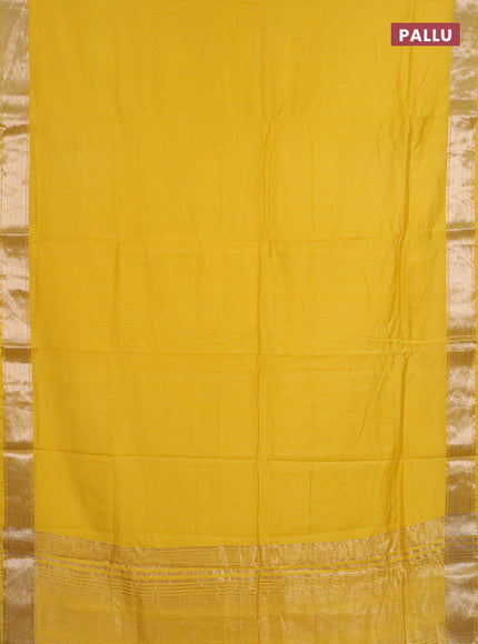 Semi chanderi saree yellow and beige with plain body and zari woven border