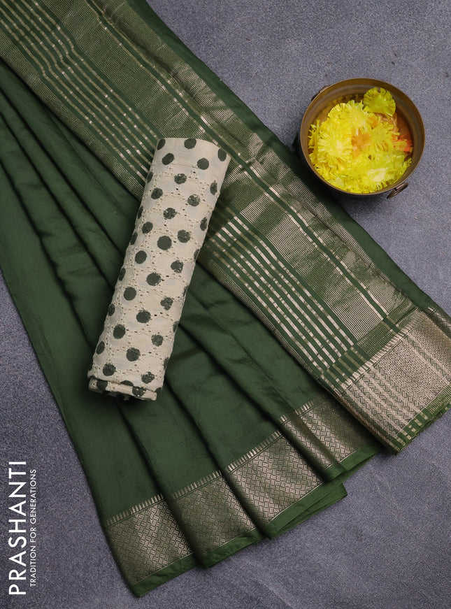 Semi chanderi saree sap green and beige with plain body and zari woven border