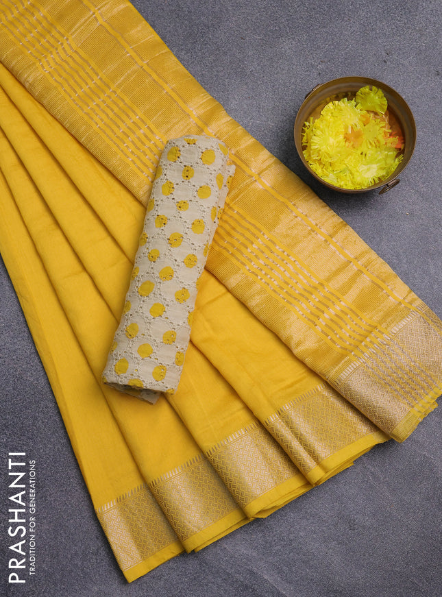 Semi chanderi saree yellow and beige with plain body and zari woven border