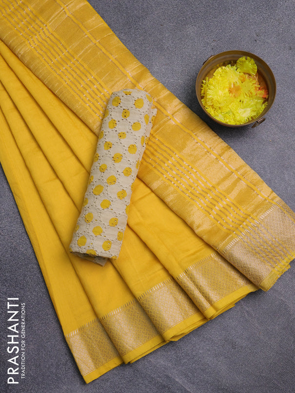 Semi chanderi saree yellow and beige with plain body and zari woven border