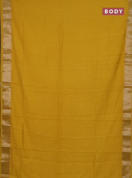 Semi chanderi saree yellow and beige with plain body and zari woven border