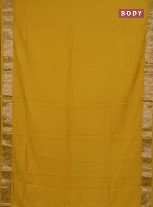 Semi chanderi saree yellow and beige with plain body and zari woven border