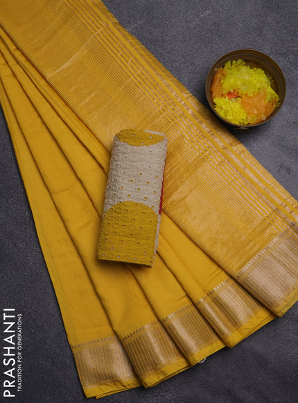 Semi chanderi saree yellow and beige with plain body and zari woven border